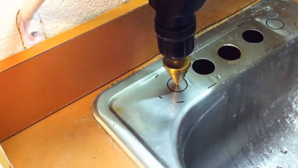 How to make a hole in a stainless steel sink